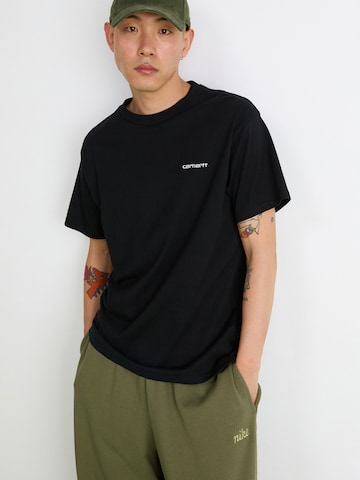 Tapered Pantaloni 'CLUB' de la Nike Sportswear pe verde
