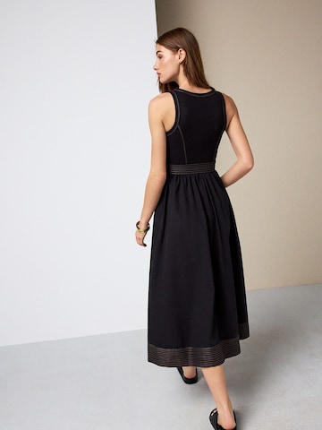 Robe Next en noir
