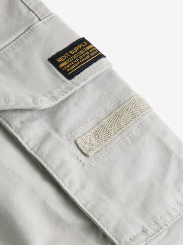 Tapered Pantaloni di Next in grigio