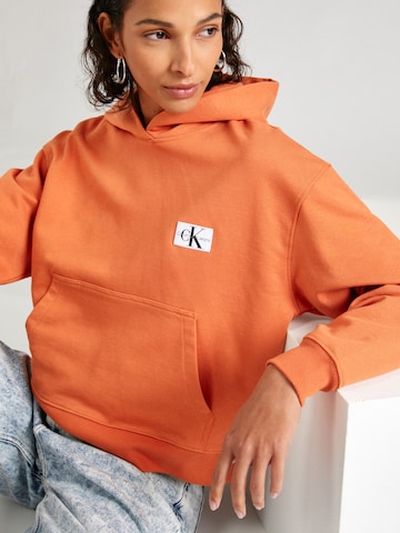 Calvin Klein Jeans Суичър в оранжево