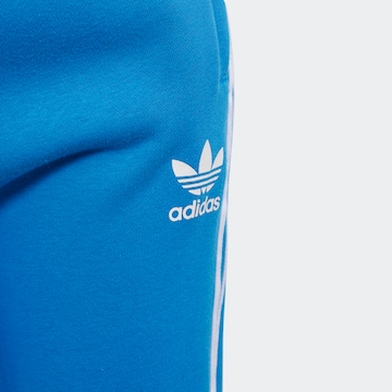 Tapered Pantaloni 'Trefoil' di ADIDAS ORIGINALS in blu
