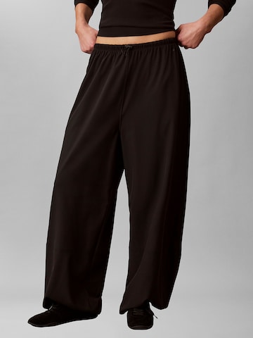 Calvin Klein Sport Loose fit Pants in Black: front