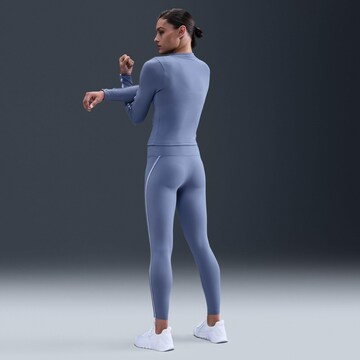 NIKE Skinny Workout Pants in Purple