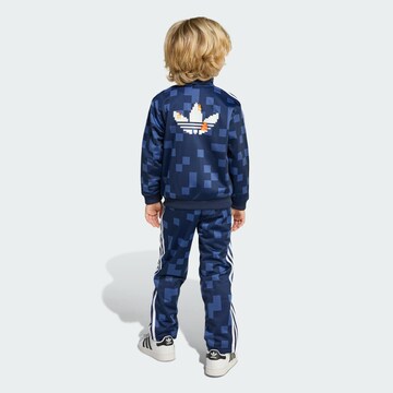 ADIDAS ORIGINALS Костюм для бега 'Adidas Originals X Minecraft Firebird' в Синий