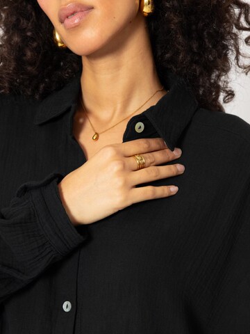 SASSYCLASSY Bluse 'kürzere Variante' in Schwarz