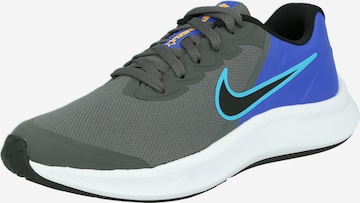 NIKE Sports shoe in Grey: front