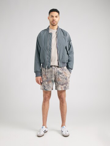 HOLLISTERLoosefit Hlače - zelena boja