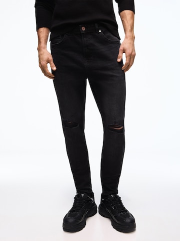 Bershka Tapered Jeans i sort: forside