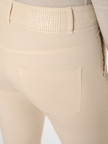Cambio Boot cut Trousers with creases 'Farah' in Beige