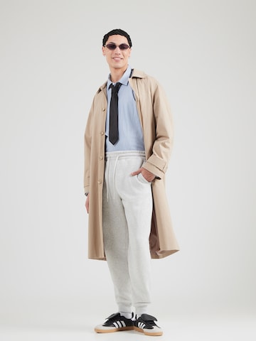 HOLLISTER - Tapered Calças em cinzento