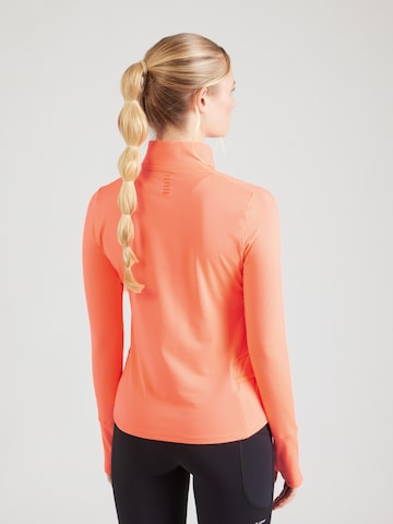 Maglia funzionale 'Qualifier Run' di UNDER ARMOUR in arancione