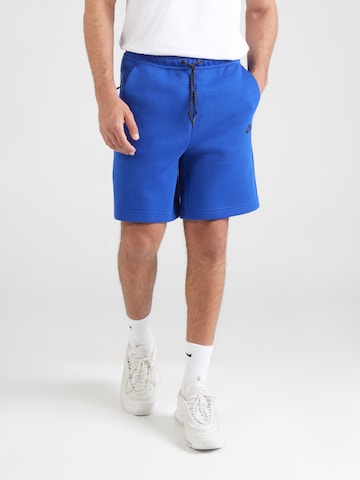 Nike SportswearLoosefit Hlače 'TECH FLC' - plava boja: prednji dio