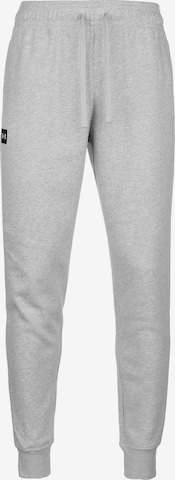 UNDER ARMOUR Tapered Workout Pants in Grey: front