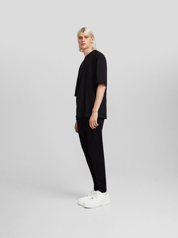 Bershka Tapered Hose in Schwarz