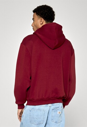 Veste de survêtement 'Essential' Karl Kani en rouge