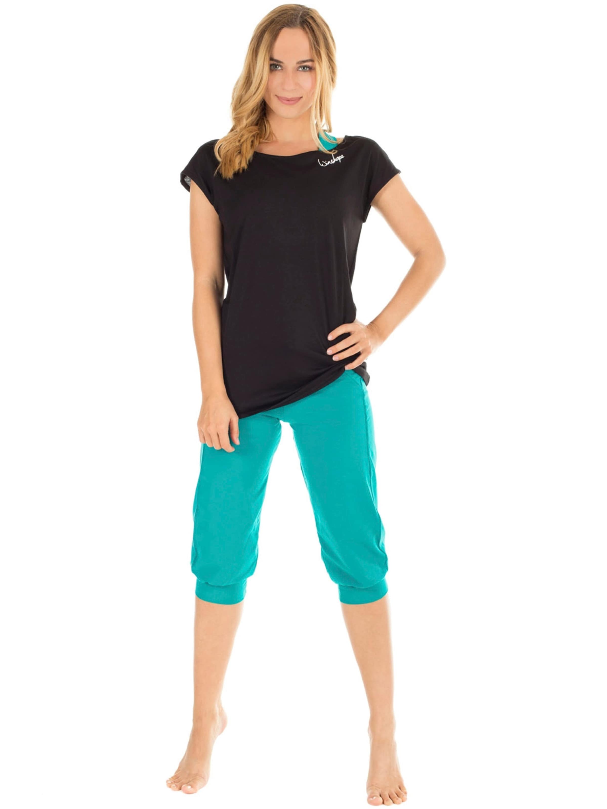 Winshape Tapered Sporthose 'WBE5' in Grün