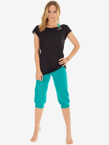 Tapered Pantaloni sport 'WBE5' de la Winshape pe verde