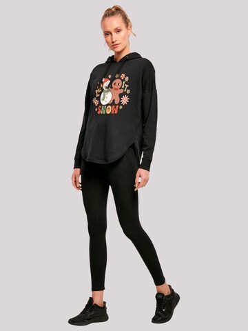 F4NT4STIC Sweatshirt 'Let It Snow Groovy Christmas Gingerbread' in Zwart