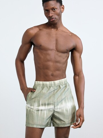 Desigual - Bermudas en verde: frente