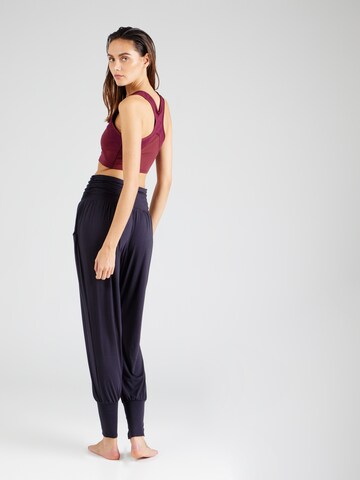 CURARE Yogawear Tapered Sportbroek in Blauw