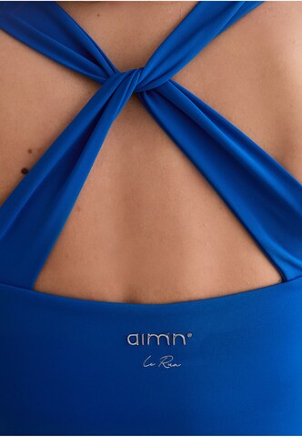 Top sportivo di Aim'n in blu