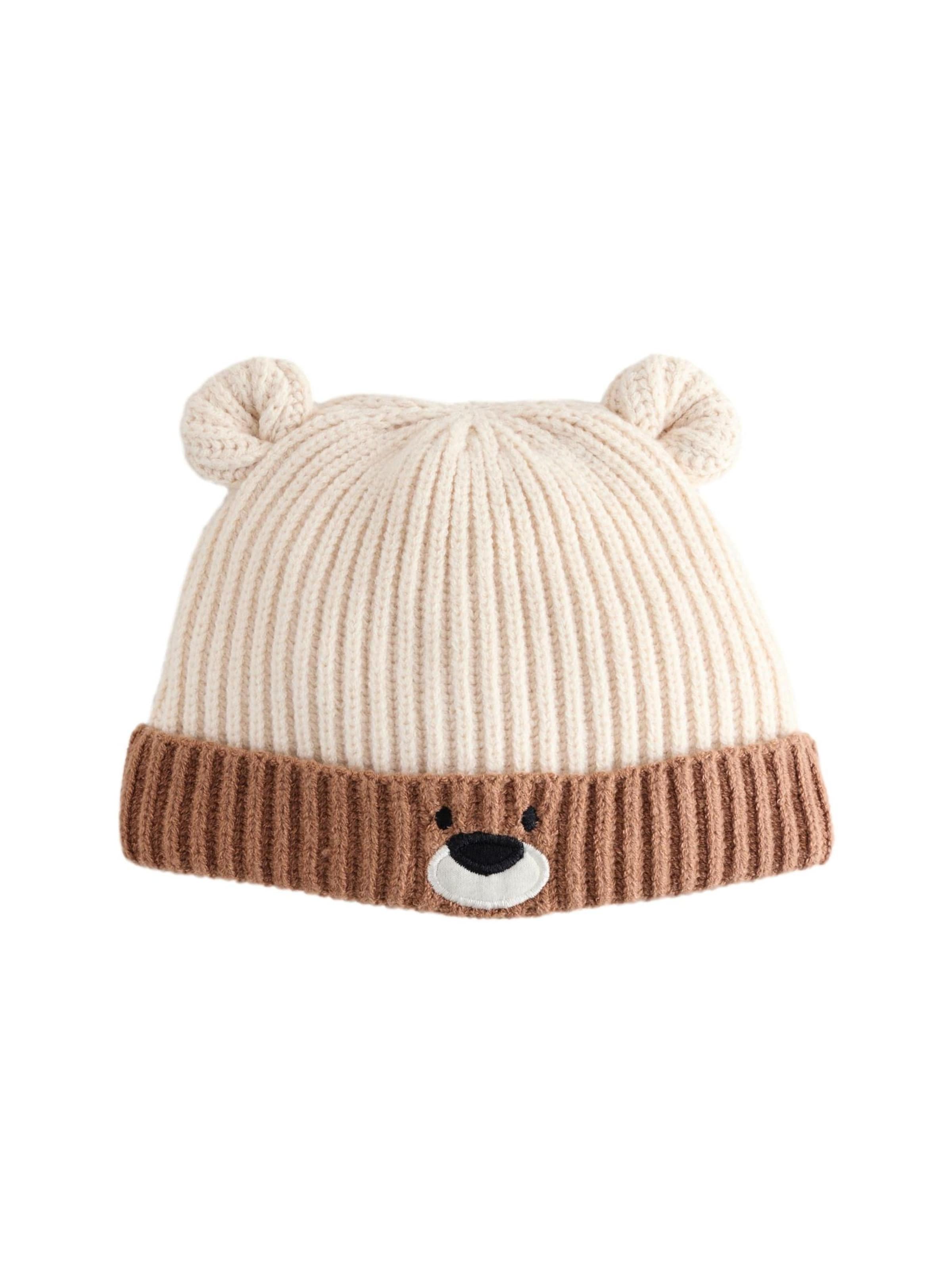 Next Hue i beige: forside