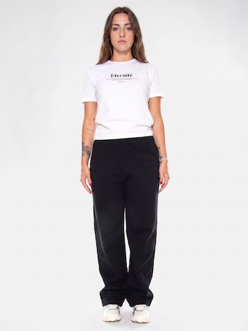 Baggy Pantaloni 'W' CASSIE SWEAT PANT BLACK / SILVER' di Carhartt WIP in nero