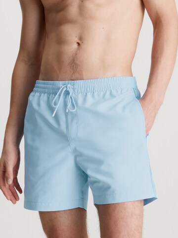 Calvin Klein Swimwear Kratke kopalne hlače | modra barva: sprednja stran
