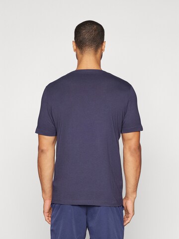 PUMA T-Shirt 'ESS Tape' in Blau