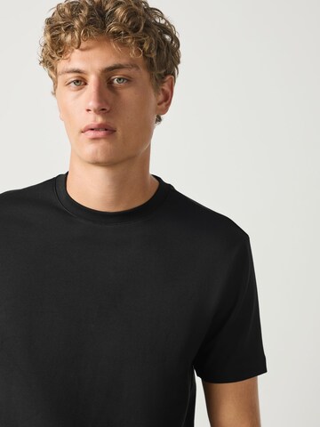 Next T-Shirt 'Motionflex' in Schwarz