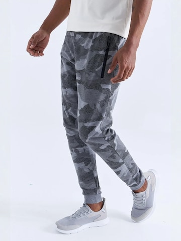 Tommy Life - Skinny Calças de desporto em cinzento