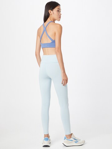 Slimfit Leggings di new balance in blu