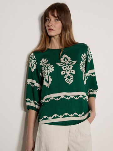 Chemisier Apricot en vert