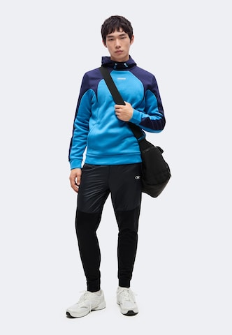 UNDER ARMOUR - Camiseta deportiva en azul