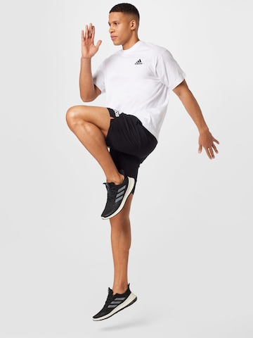 Regular Pantaloni sport 'Run It' de la ADIDAS SPORTSWEAR pe negru