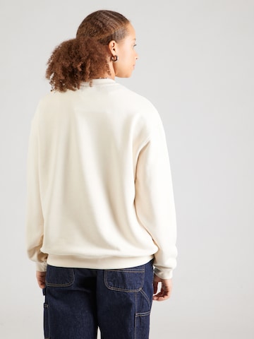 Kaotiko Collegepaita 'CAMELIA' värissä beige
