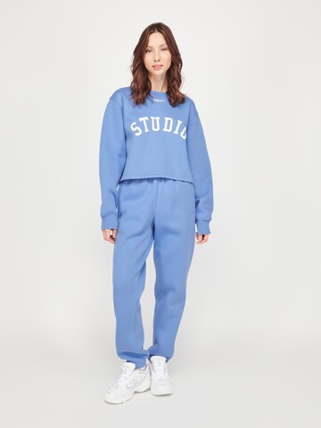 ABOUT YOU x VIAM Studio Regular Pants 'Spirit' in Blue: front