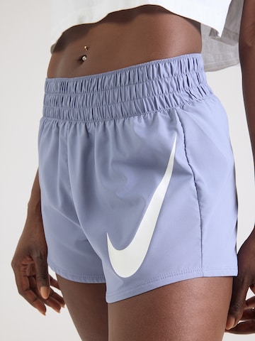 NIKE Štandardný strih Športové nohavice 'ONE SWOOSH' - Modrá