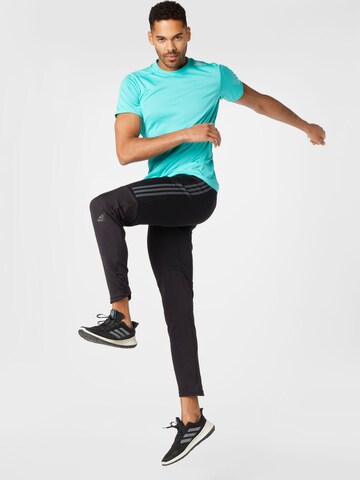 ADIDAS SPORTSWEAR Slim fit Sports trousers 'Run' in Black