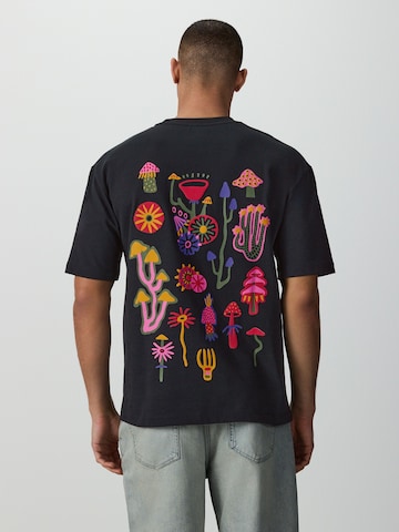 T-Shirt Next en bleu : devant