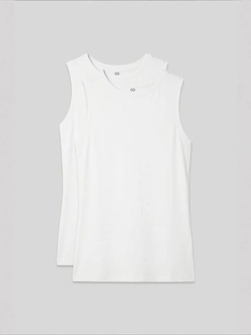 Top sportivo di Tommy Life in bianco: frontale