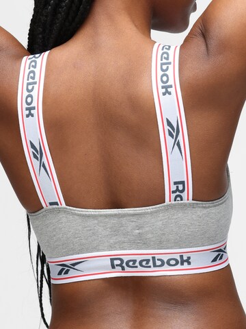 Bustino Reggiseno sportivo di Reebok in grigio