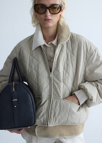 Veste mi-saison MANGO en beige