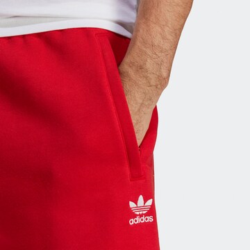 ADIDAS ORIGINALS Regular Pants 'Trefoil Essentials' in Red