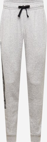 UNDER ARMOUR Tapered Workout Pants 'Rival' in Grey: front