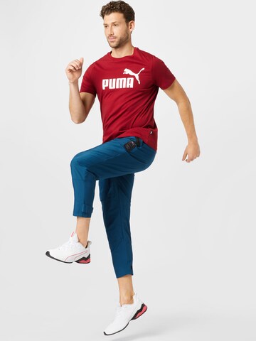 PUMA Loosefit Sportovní kalhoty 'First Mile' – modrá