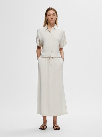 SELECTED Rok in Wit