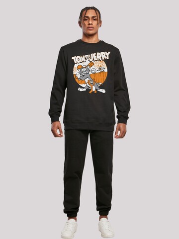F4NT4STIC Sweatshirt 'Tom And Jerry Play Baseball' in Zwart