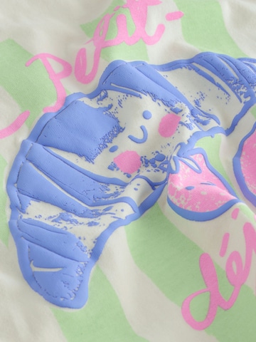 Pijamale de la Next pe bej