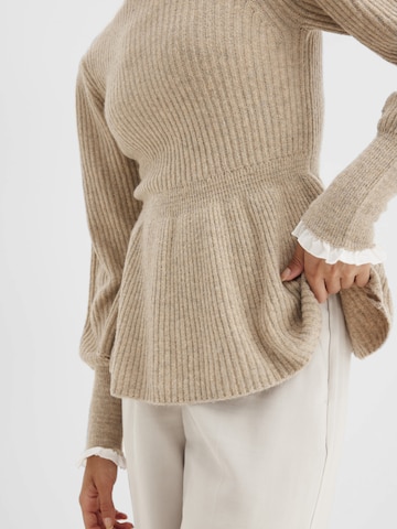 bonprix Tröja i beige